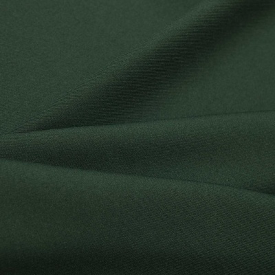 Ткань костюмная 21010 2076, 225 гр/м2, шир.150см, цвет т.зеленый - купить в Калининграде. Цена 390.73 руб.